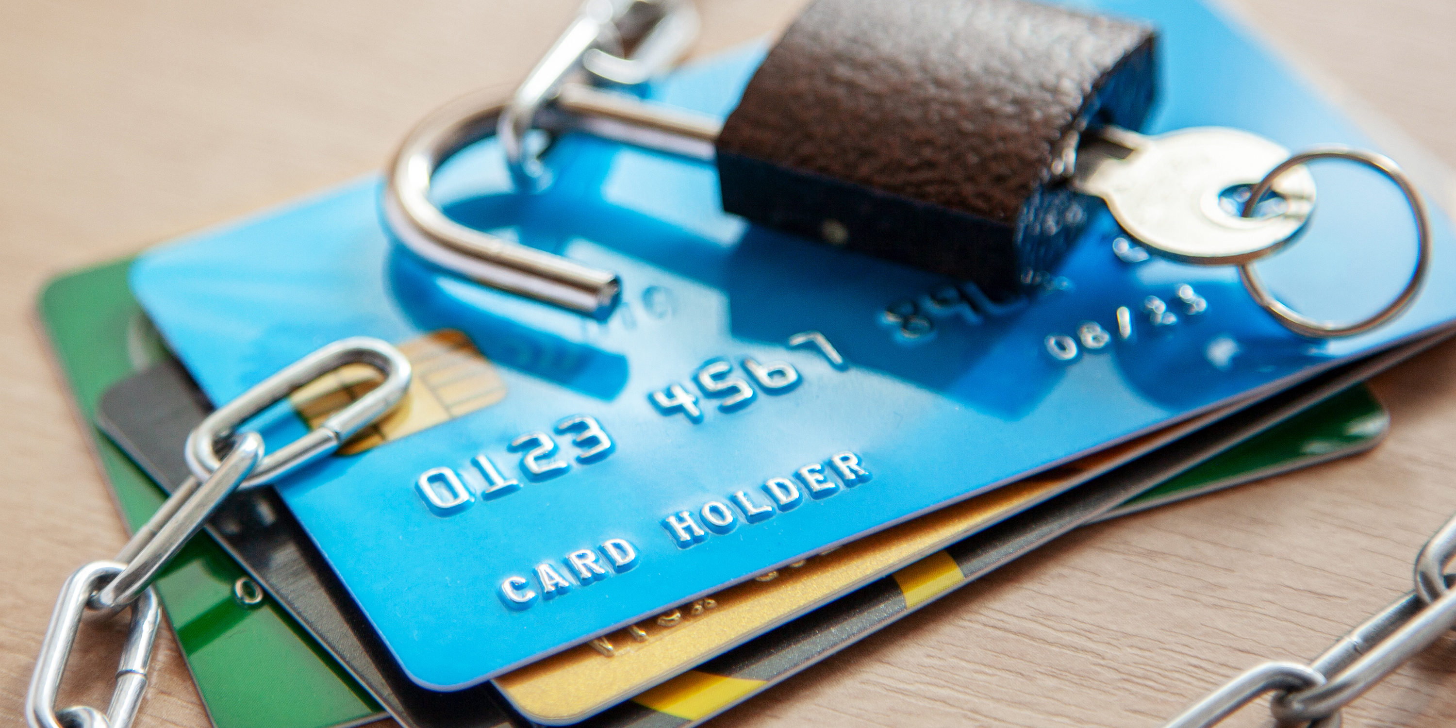 Credit cards with an open lock and chain. Open access to the use of electronic money image