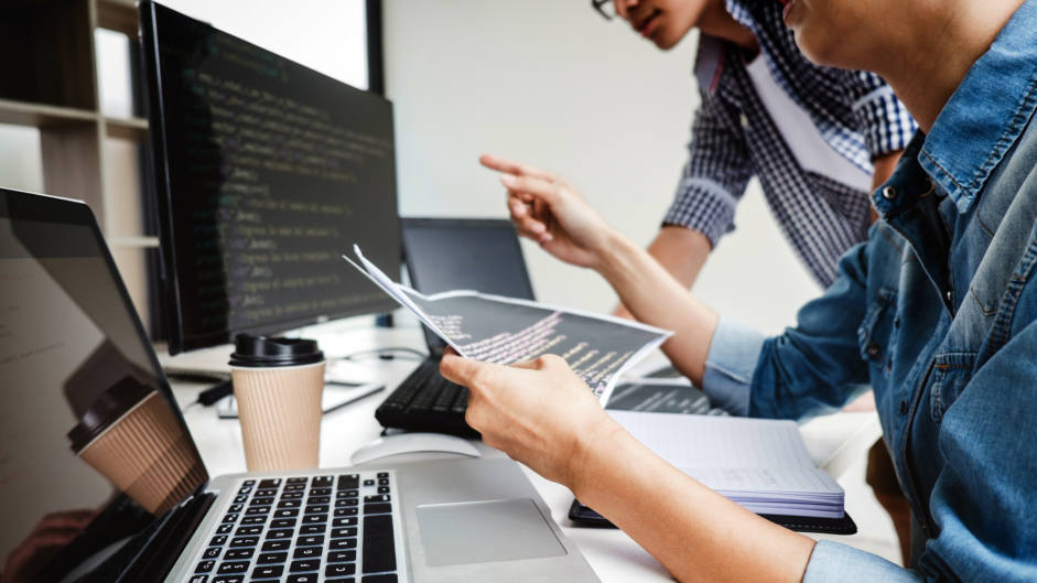 Programmers Cooperating At Developing Programming And Website Wo Programmers Cooperating At Developing Programming And Website Wo