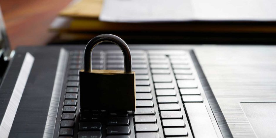 cybersecurity-work-from-home-covid19 lock on keyboard