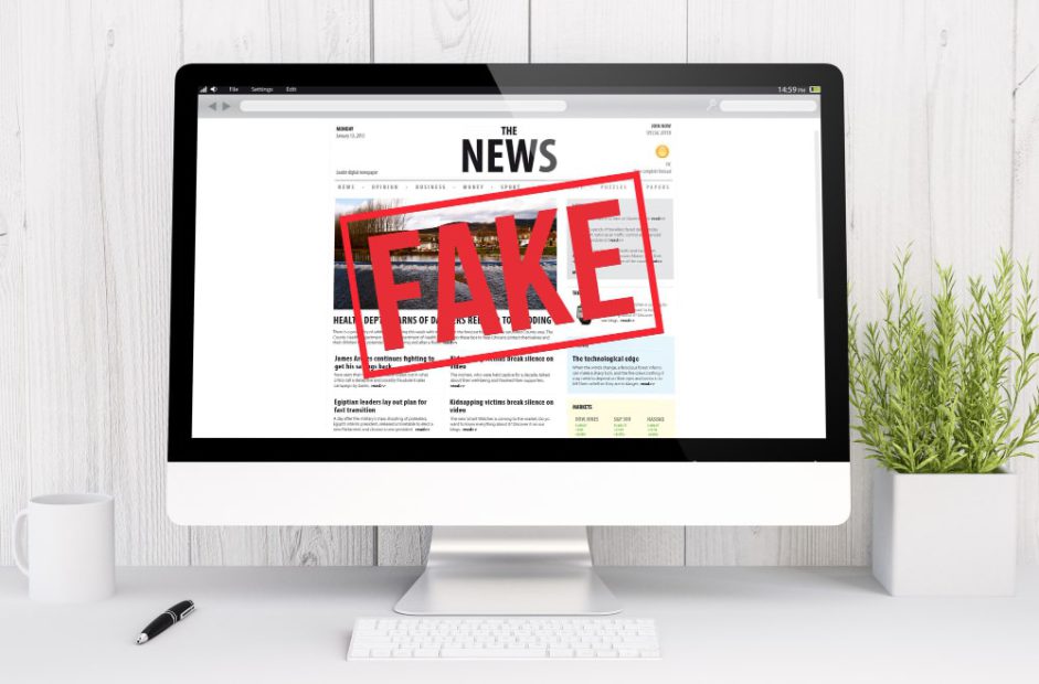 3d-rendering-fake-news-computer-min