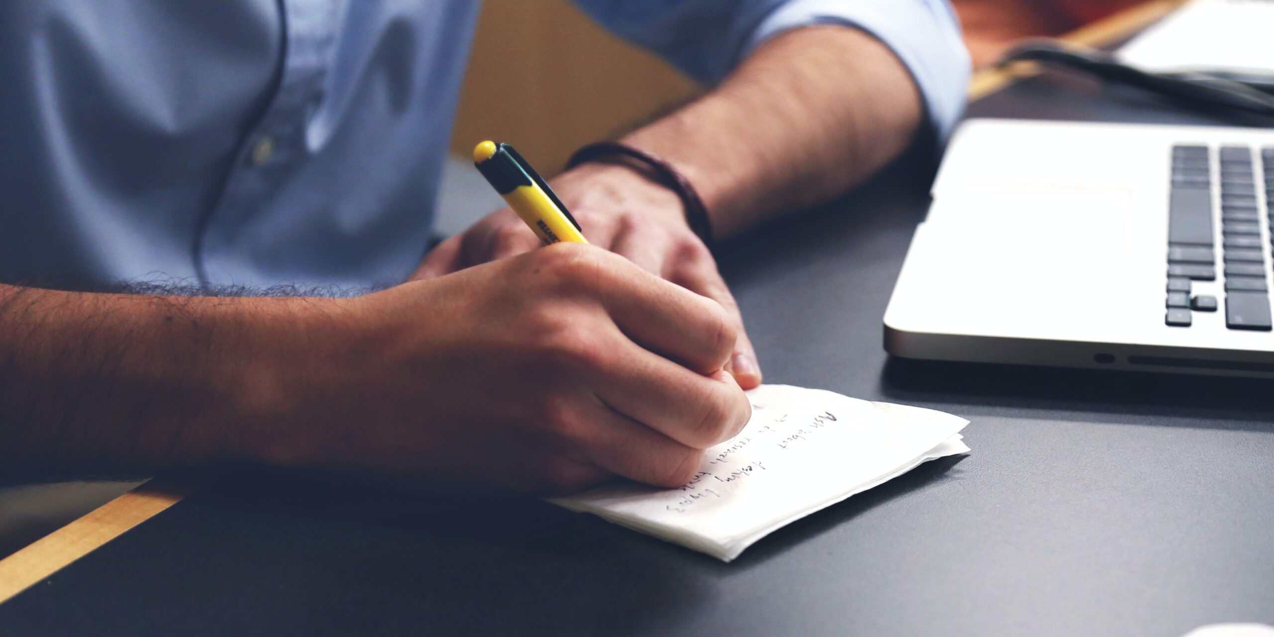 10-Tips-to-Help-Small-Businesses-Get-Ready-for-the-Unexpected-scaled.jpg Free Person Writing on Paper Using Yellow and Black Pen Stock Photo